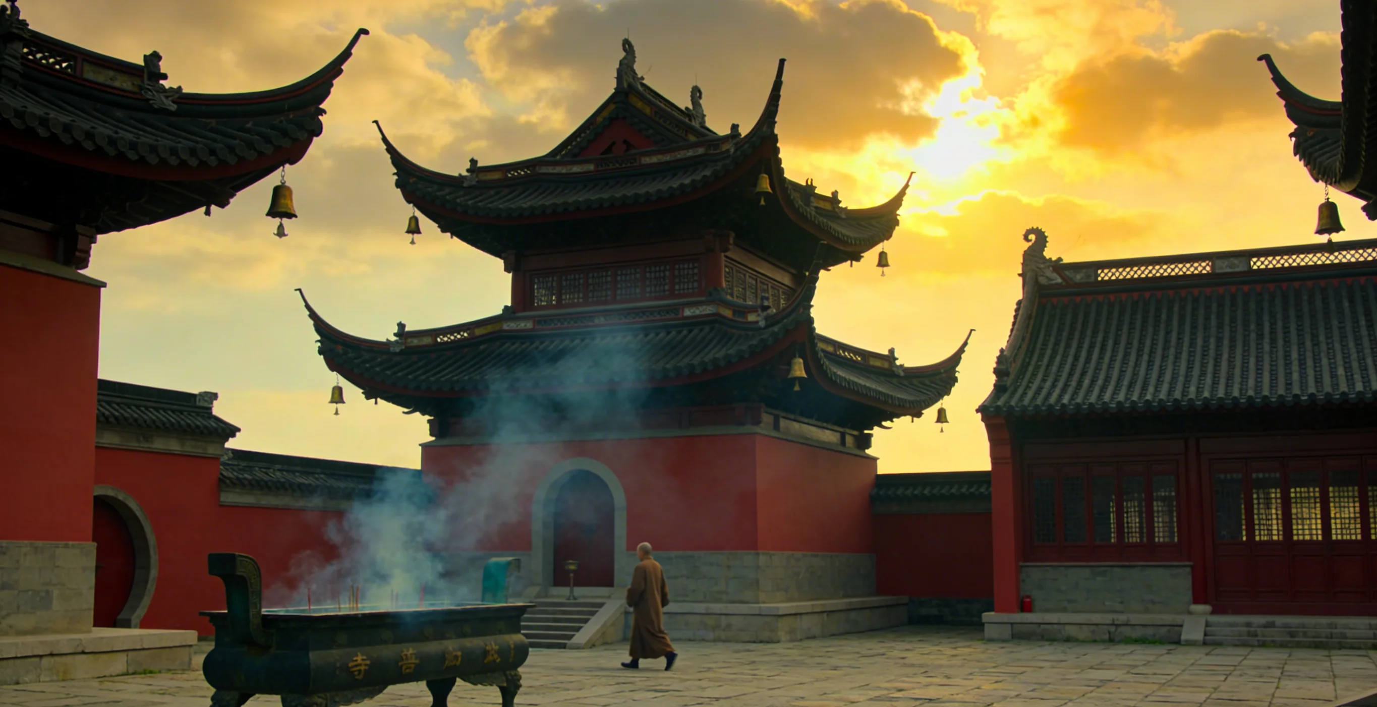 Visitors entering a Chinese temple in modest dress, observing quiet temple etiquette