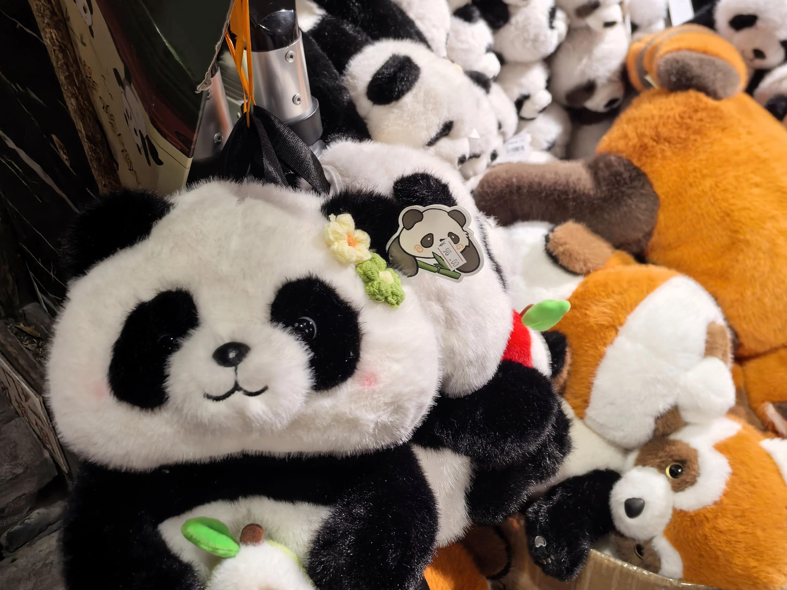 Colorful market stall in Chengdu displaying spices, snacks, and local specialties