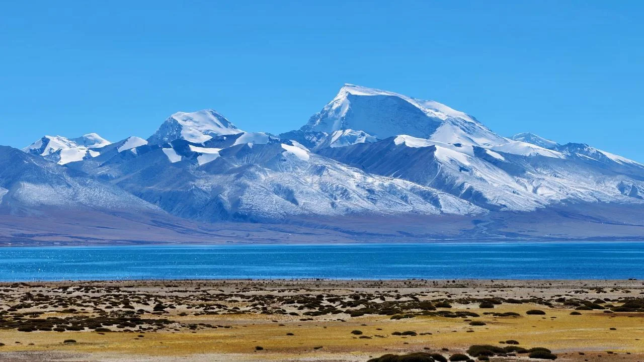 Mount Everest view from Tibet with prayer flags in the foreground