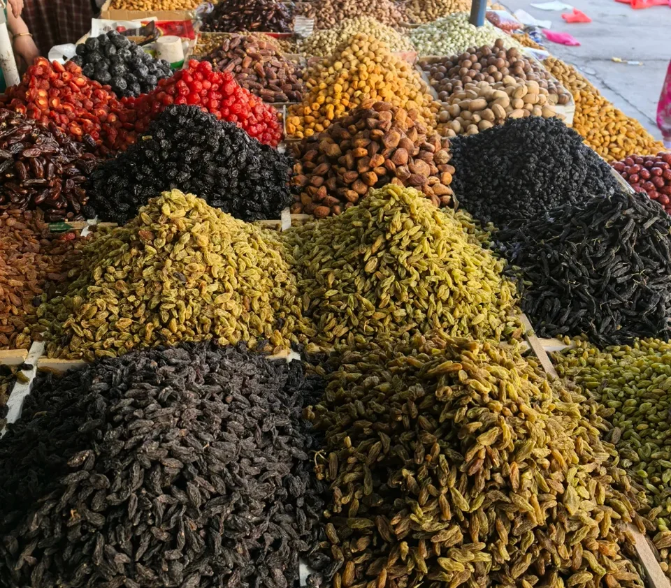 Assorted Northwest Chinese dishes with noodles, lamb, and regional snacks on a dining table