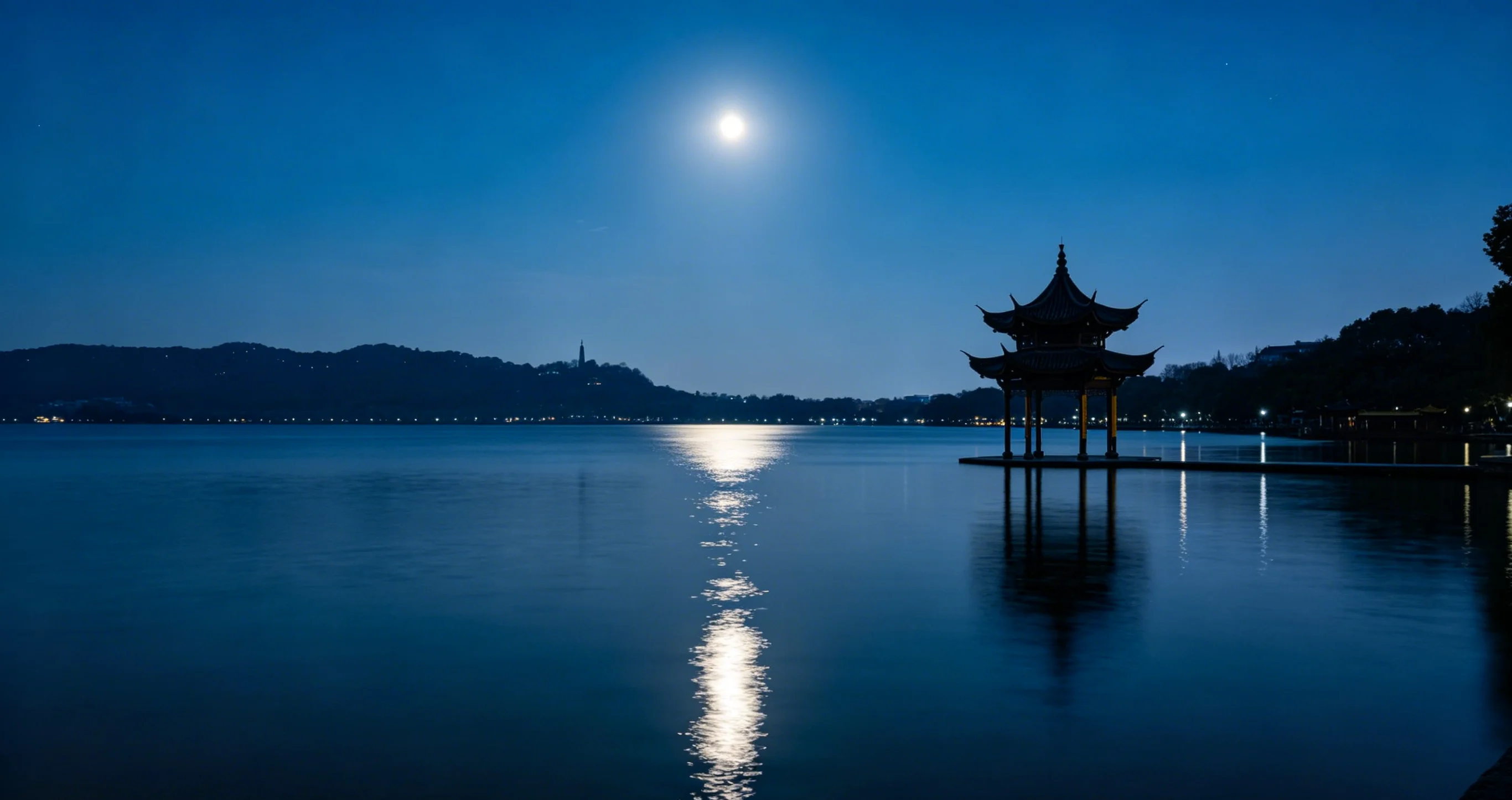 Broken Bridge over West Lake with calm water and distant hills in Hangzhou