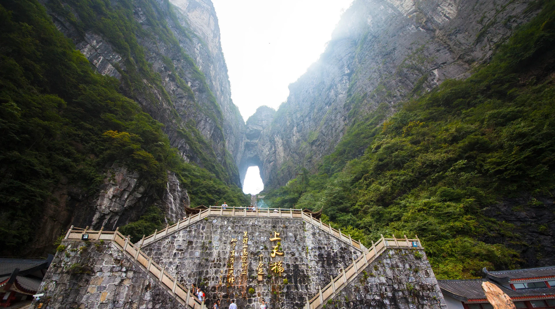 Karst sandstone pillars and misty summit views in Zhangjiajie mountain landscape