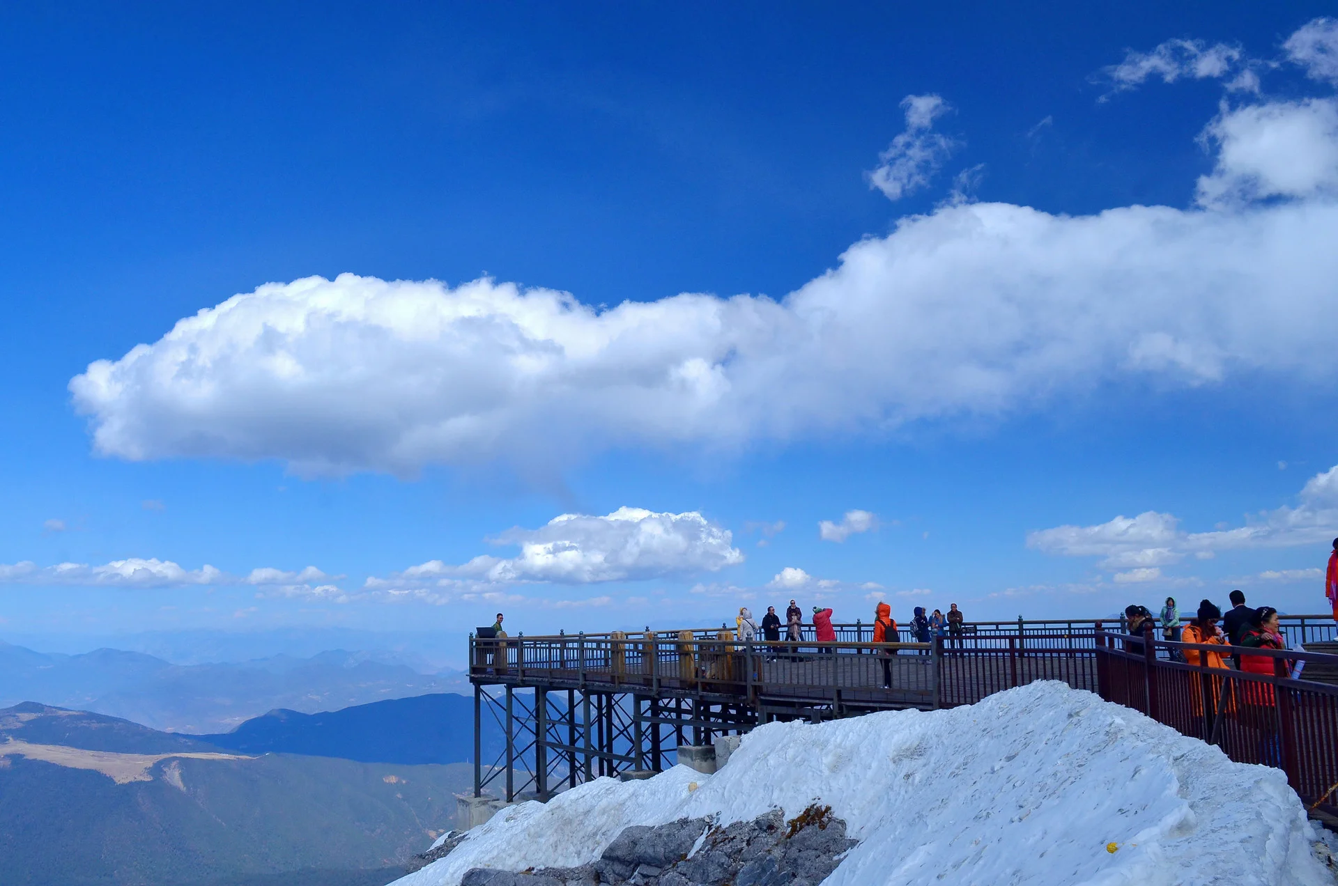 Sacred Buddhist scenery on Mount Emei with forested slopes and mountain temples