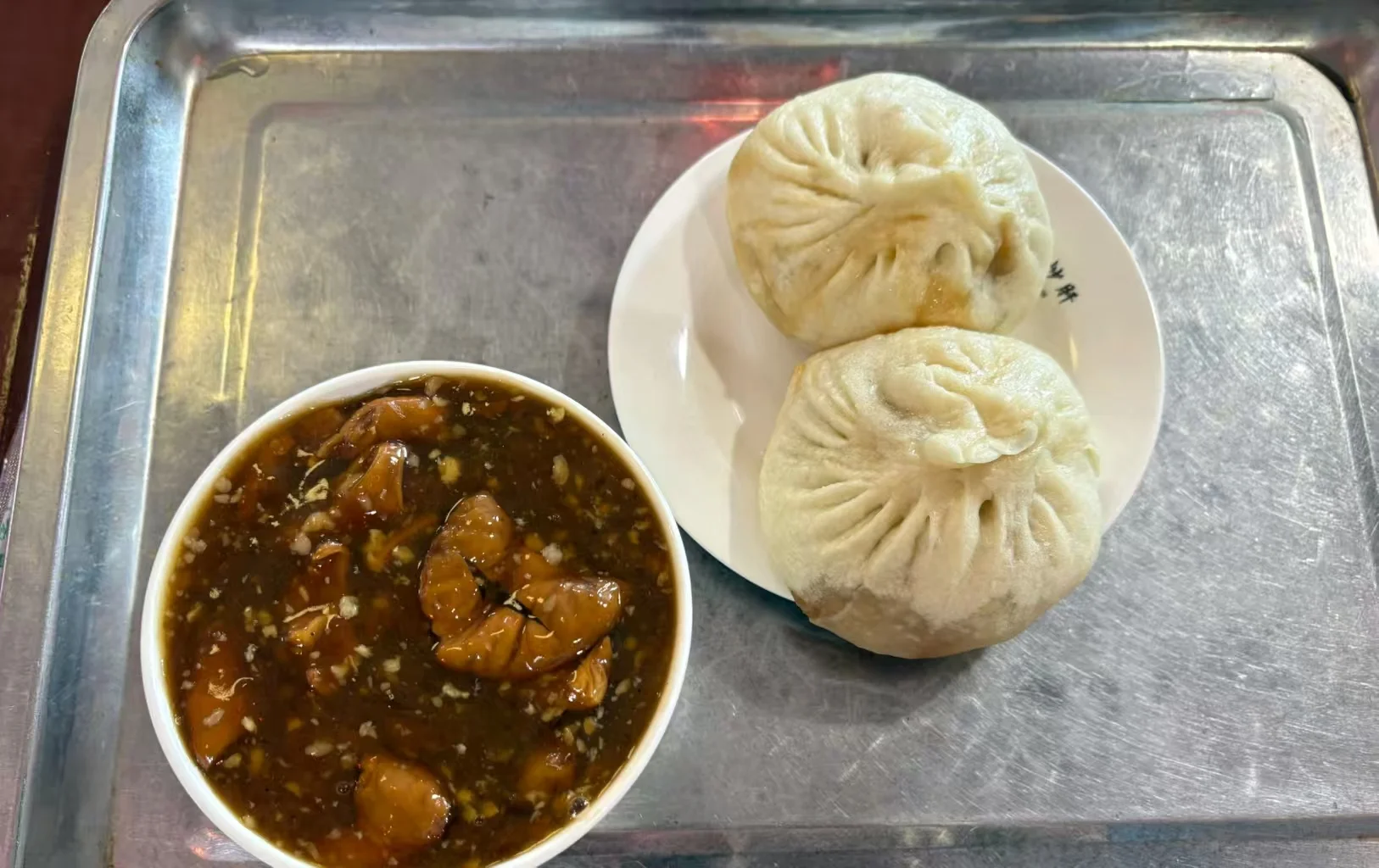 Street vendor serving jianbing, a popular Beijing breakfast snack