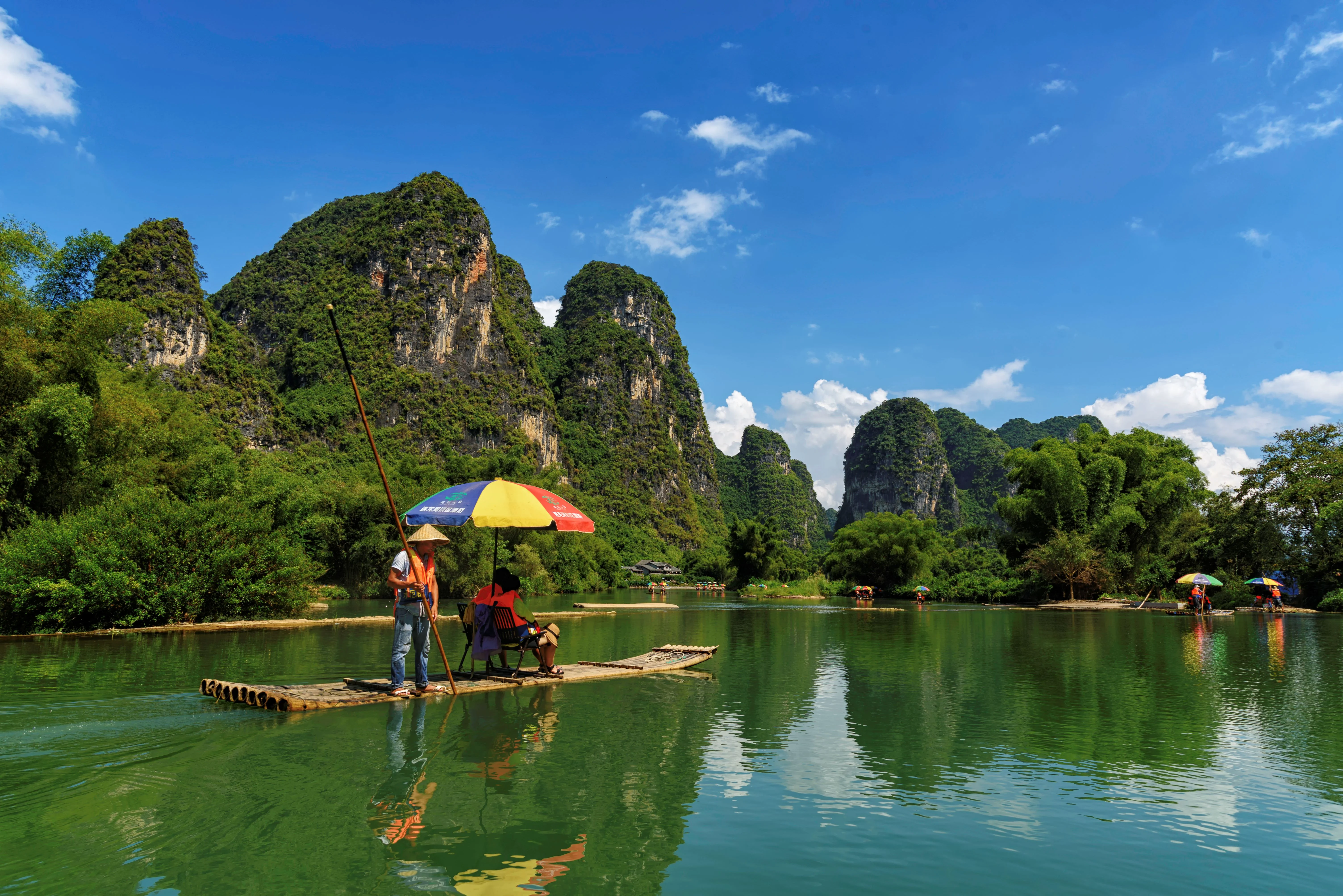 Yangshuo countryside with karst peaks, river, and rural Guilin landscape