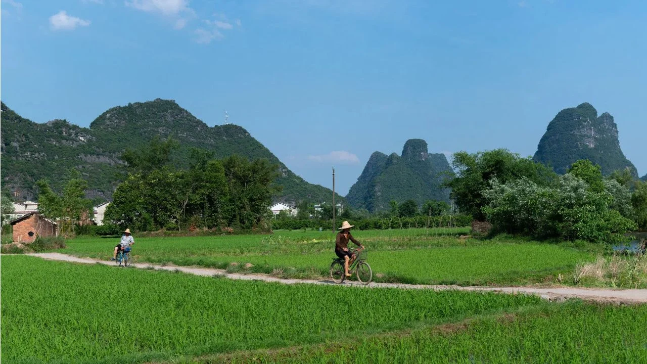Guilin skyline with karst hills and the Li River at sunset