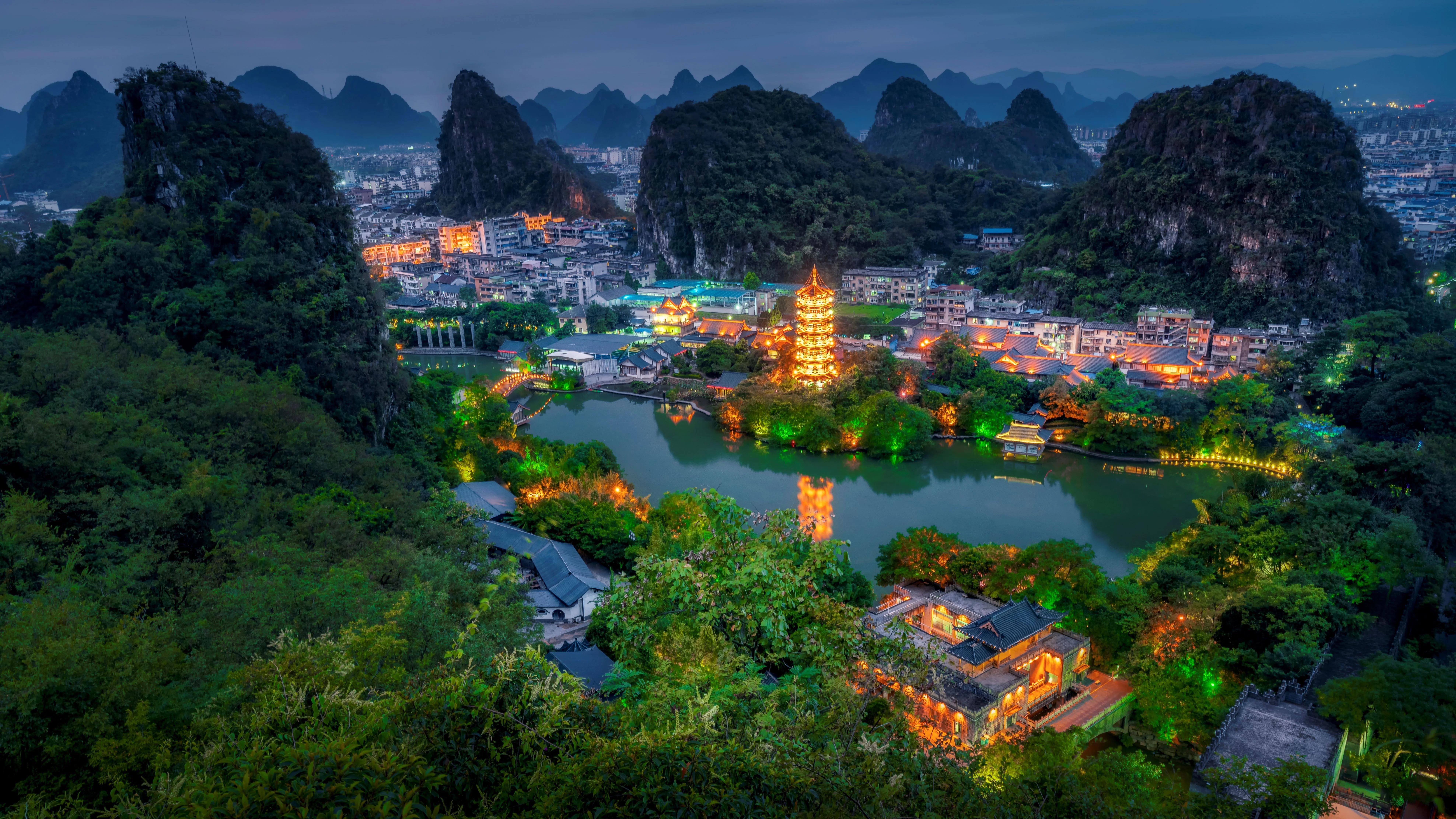 Longji Rice Terraces layered across green mountains near Guilin