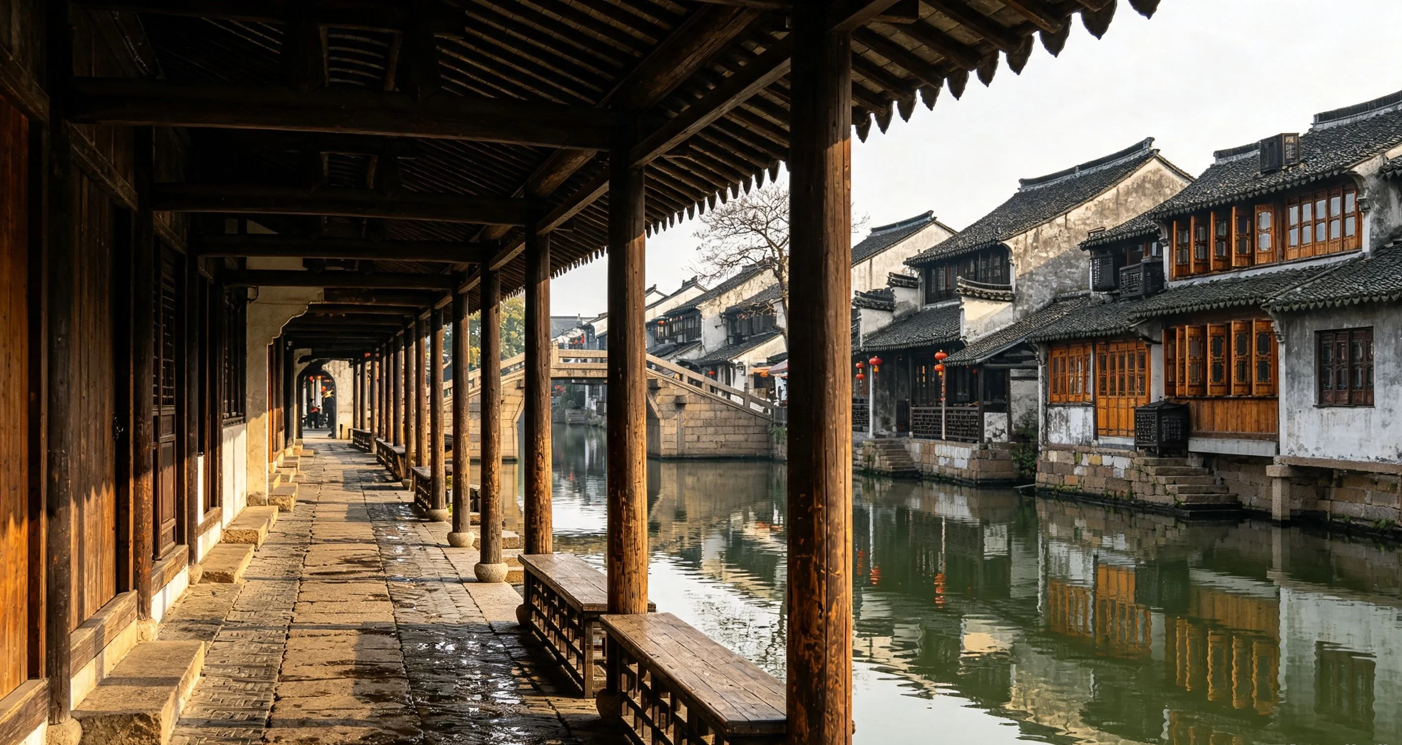 Historic Chinese residential street lined with tiled roofs, brick walls, and narrow alleys