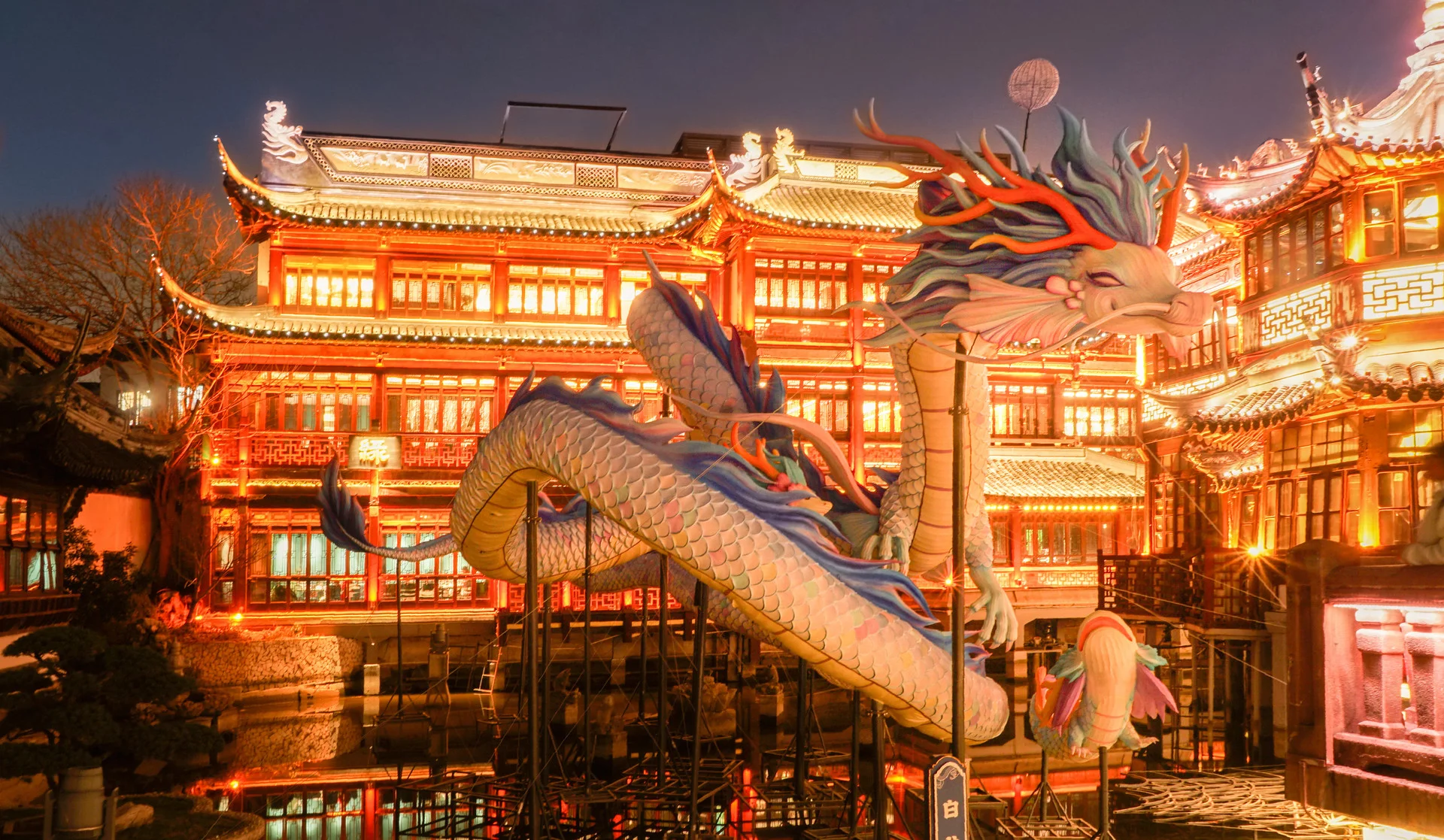 Crowded pedestrian shopping district in Beijing with malls and street retail
